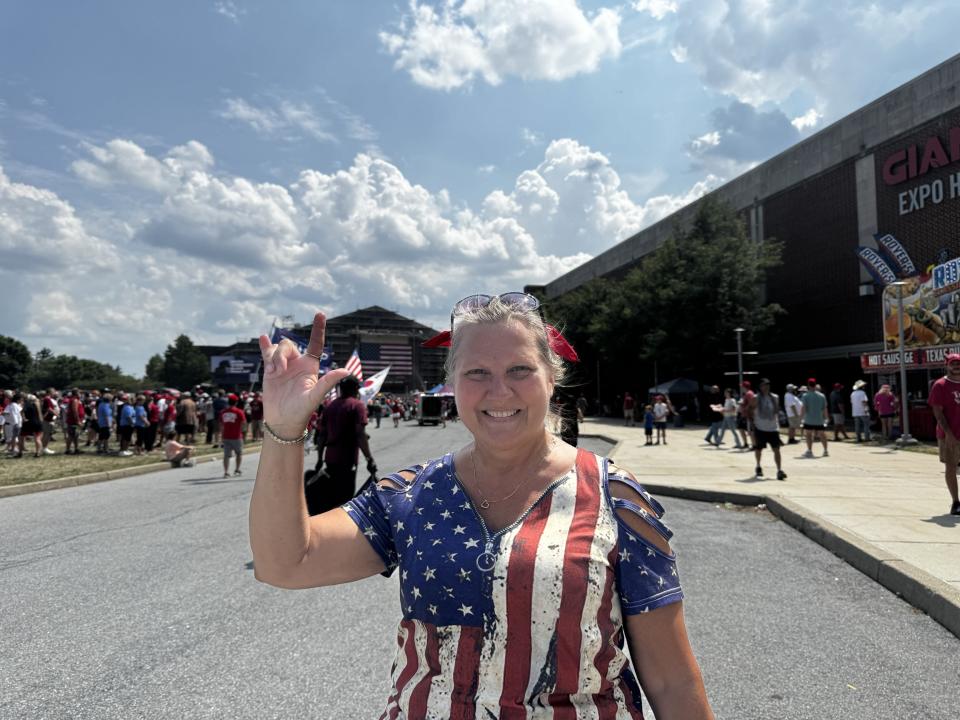 JoEllen Holler, 54, of Denver, Pennsylvania, wasn't surprised by the size of the line that had formed outside New Holland Arena in Harrisburg in anticipation of former President Donald Trump's rally Wednesday evening.