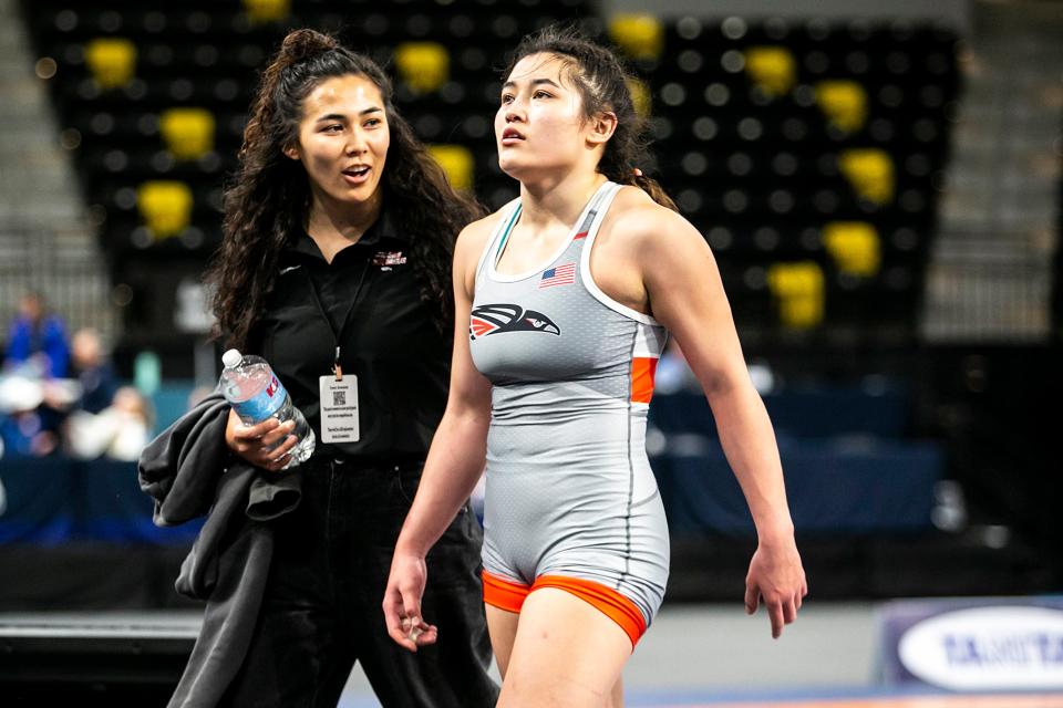 Sienna Ramirez, right, reacts after her match at 68 kg during the final session of the USA Wrestling World Team Trials Challenge Tournament on May 22 at Xtream Arena in Coralville.