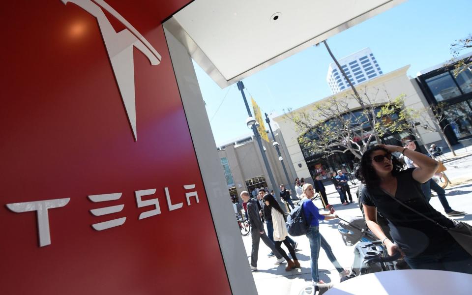 Tesla faces a court battle over its customer service - AFP