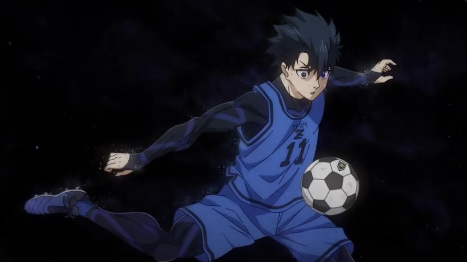 A soccer player kicking a ball