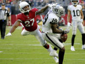 <p>Oakland Raiders wide receiver Brandon LaFell (19) can’t make the catch as Arizona Cardinals defensive back Leonard Johnson (27) defends during the second half of an NFL football game, Sunday, Nov. 18, 2018, in Glendale, Ariz. (AP Photo/Rick Scuteri) </p>