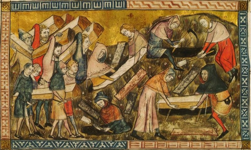 A 14th-century illustration of townsfolk burying plague victims.