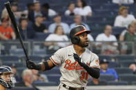 Baltimore Orioles' Cedric Mullins watches his solo home run during the third inning of the team's baseball game against the New York Yankees, Monday, Aug. 2, 2021, in New York. (AP Photo/Mary Altaffer)