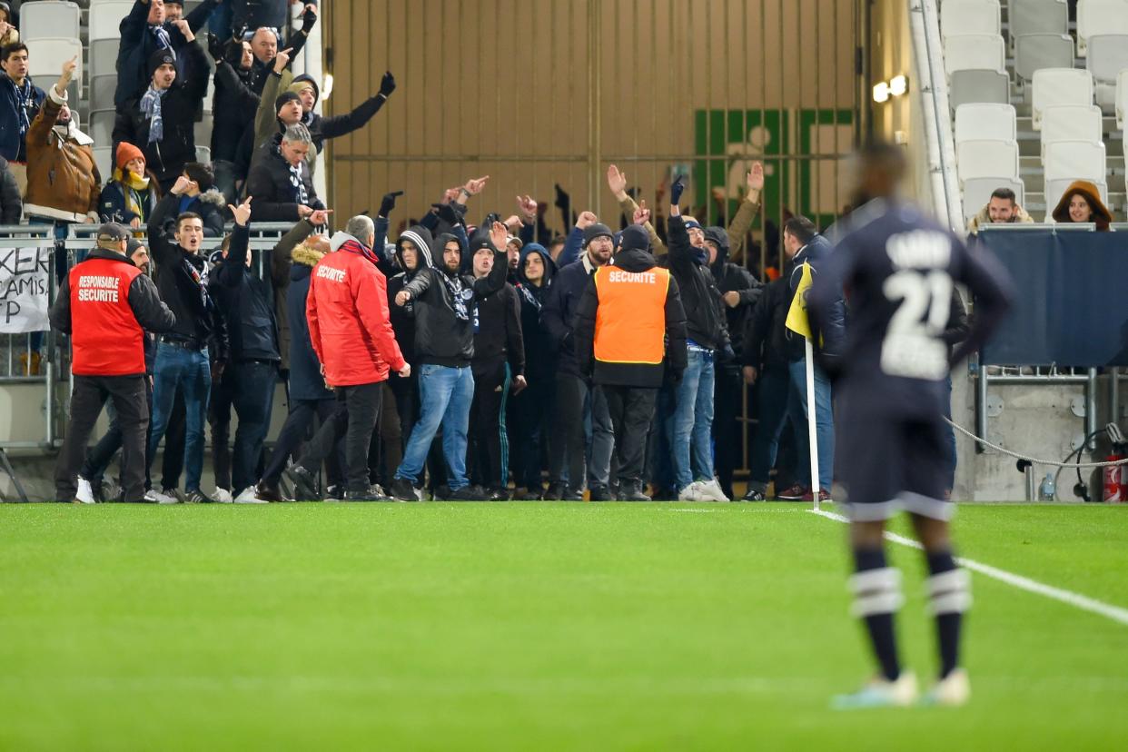 Bordeaux fans protested the club's American-led ownership during a match against Nîmes on Tuesday. (Photo by NICOLAS TUCAT/AFP via Getty Images)