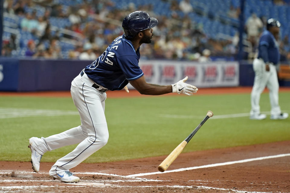 Tampa Bay Rays' Randy Arozarena drops his bat after hitting a two-run triple off Seattle Mariners starting pitcher Logan Gilbert during the third inning of a baseball game Wednesday, Aug. 4, 2021, in St. Petersburg, Fla. (AP Photo/Chris O'Meara)