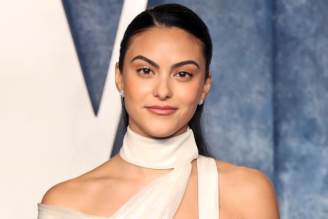 <p>Amy Sussman/Getty</p> Camila Mendes attends the 2023 Vanity Fair Oscar Party in March 2023