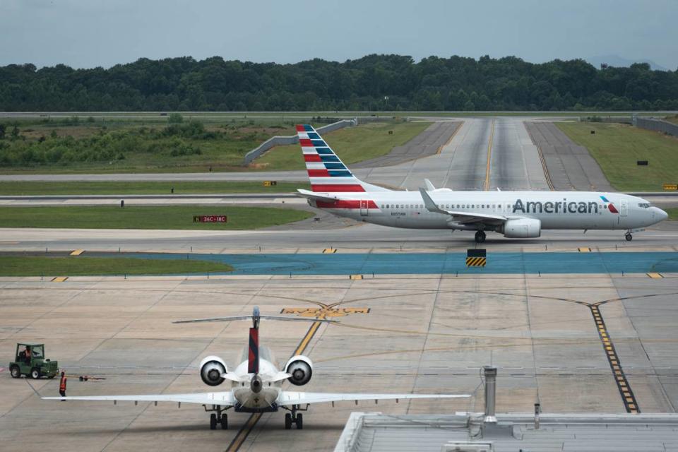 The American Airlines flight that was headed for Heathrow Airport had 264 passengers and 12 crew members on it.