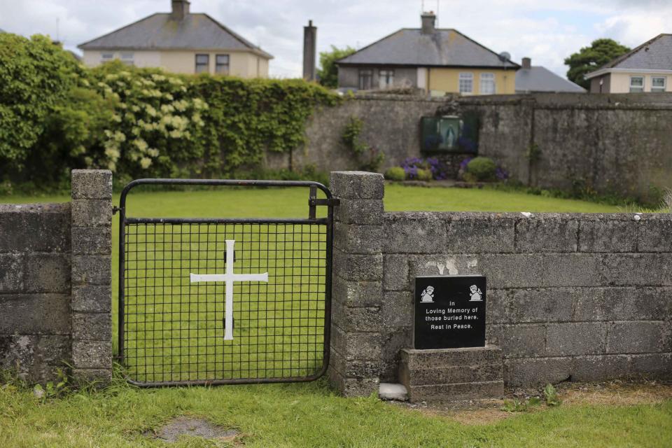 The entrance to the site of a mass grave of hundreds of children who died in the former Bons Secours home for unmarried mothers is seen in Tuam, County Galway June 4, 2014. Local residents on Tuesday said they hoped a campaign is making headway to commemorate the unmarked mass grave of nearly 800 babies found in Tuam. The infants were buried without coffins in the grounds of a former home for unmarried mothers between 1925 and 1961. A total of 796 babies toddlers and children were buried in this mass grave. Death records show the children died from malnutrition and infectious disease. REUTERS/Stringer (IRELAND - Tags: OBITUARY HEALTH)