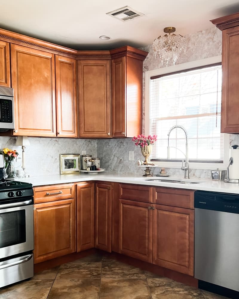 Light fixture above sink in newly renovated kitchen.