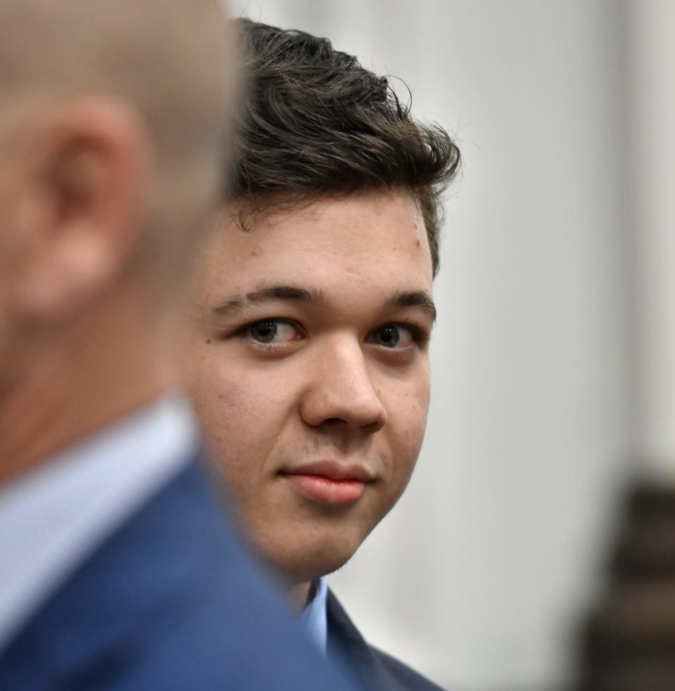 Kyle Rittenhouse waits for the third day of his murder trial to begin on Wednesday at the Kenosha County Courthouse in Wisconsin.