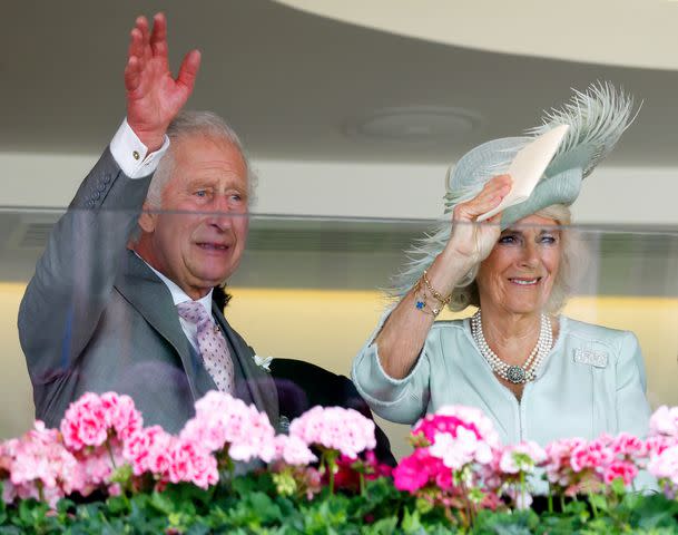 <p>Max Mumby/Indigo/Getty</p> Queen Camilla and King Charles gave a wave after their horse won the King George V Stakes at the 2023 Royal Ascot.