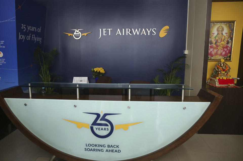 A Jet airways reception desk is seen deserted at the company's headquarters in Mumbai, India Thursday, April 18, 2019. Jet Airways, once India's largest airline, announced on Wednesday that it is suspending all operations after failing to raise enough money to run its services. (AP Photo/Rafiq Maqbool)