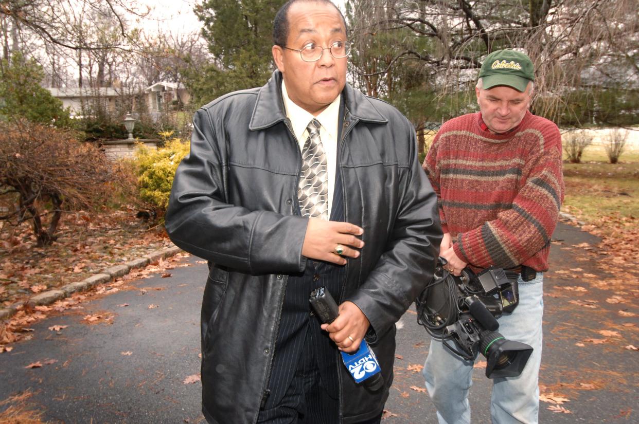 Reporter Pablo Guzman, center, and his cameraman, George Mitchell, right, for CBS News arrive at 38 Woodmere Road in Cedar Grove in 2008, the residence of Stanton Popewiny, 23, of Philadelphia, and Eugene Hrabarchuck.