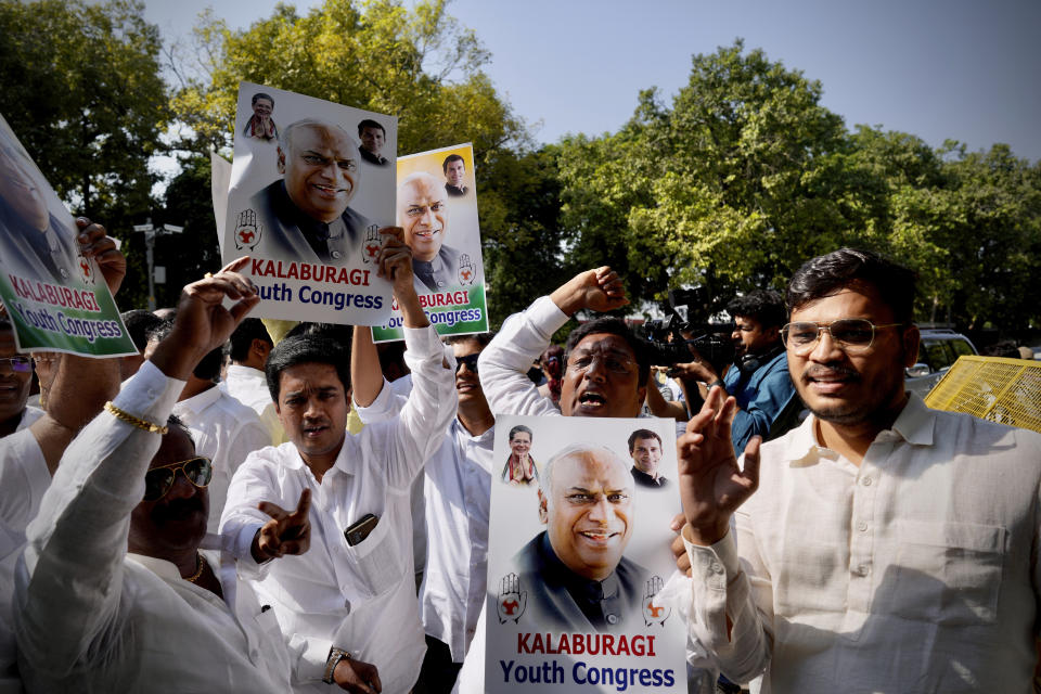 Congress party suppporters celebrate outside the residence of newly elected party president Mallikarjun Kharge in New Delhi, India, Wednesday, Oct. 19, 2022. India’s main opposition Congress party elected Kharge as its new president on Wednesday in a contest in which the dominant Nehru-Gandhi dynasty did not compete. (AP Photo/Manish Swarup)