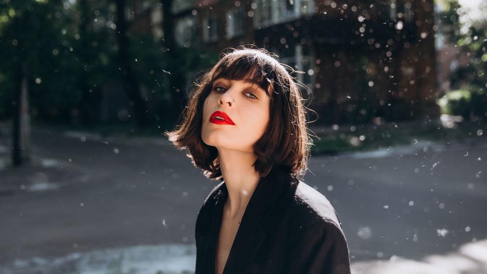 woman wearing bright red lipstick