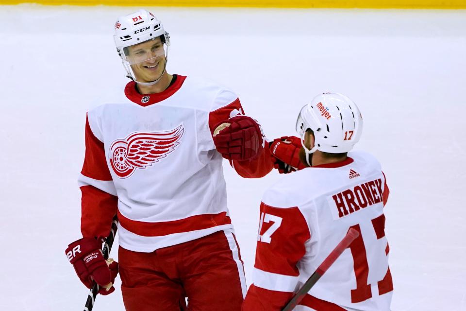 Red Wings forward Dominik Kubalik, left, celebrates with defenseman Filip Hronek after scoring against the Penguins during the first period of the preseason game on Tuesday, Sept. 27, 2022, in Pittsburgh.