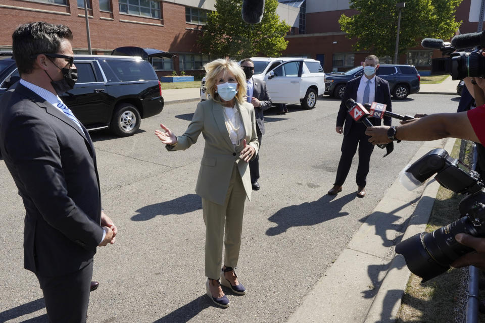 First lady Jill Biden speaks about President Joe Biden testing positive for COVID-19, as she arrives to visit Schulze Academy, Thursday, July 21, 2022, in Detroit. (AP Photo/Carlos Osorio)