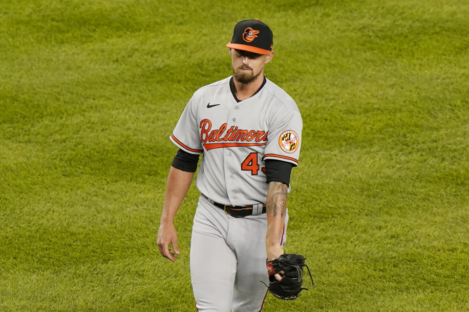 Baltimore Orioles relief pitcher Shawn Armstrong reacts after giving up a grand slam to New York Yankees designated hitter Giancarlo Stanton during the fifth inning of a baseball game, Monday, April 5, 2021, at Yankee Stadium in New York. (AP Photo/Kathy Willens)