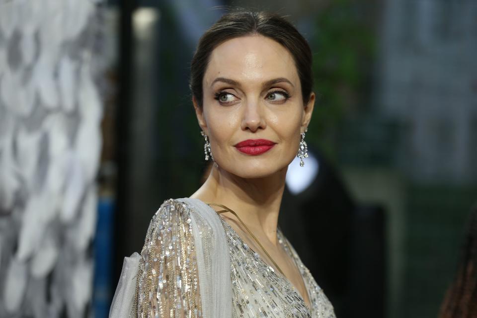 US actress Angelina Jolie poses on the red carpet upon arrival for the European premiere of the film 
