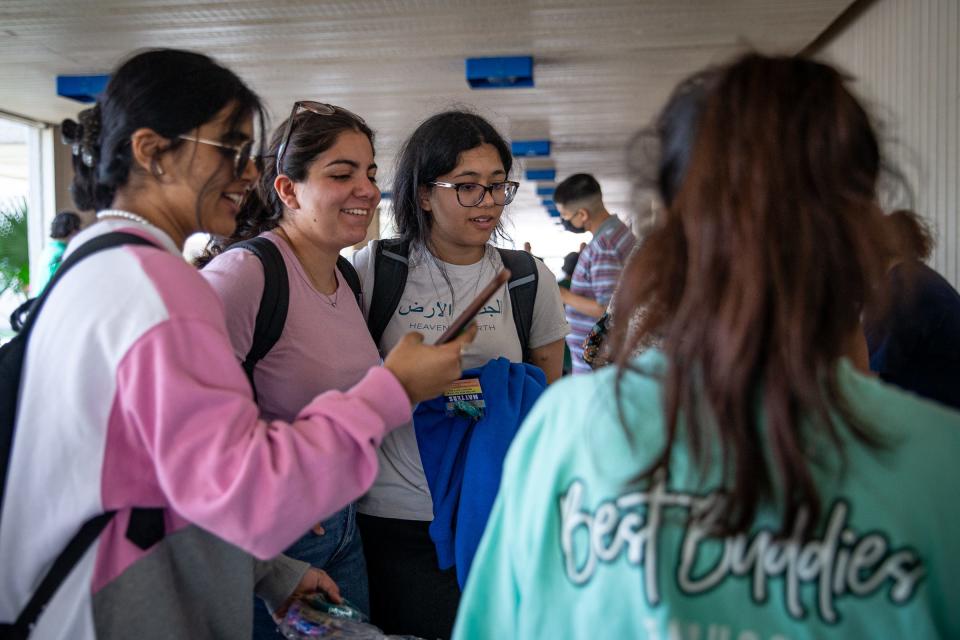 University students, from left, Alishba Kazmi, Mikayla Molina, Niha Ahme, learn about the Best Buddies program at Texas A&M University-Corpus Christi on Feb. 22, 2023.