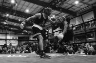 <p>EMS officer Caleb Tavarez knocks fellow officer Olkuncle Oladipuipo off balance during the “Bronx Tough Turkey Tussle” at the New York Expo Center in the Bronx, New York, on Nov. 16, 2017. (Photo: Gordon Donovan/Yahoo News) </p>