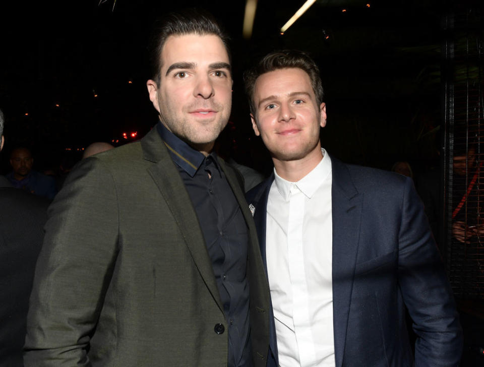 zachary and jonathan in suits at a gq event