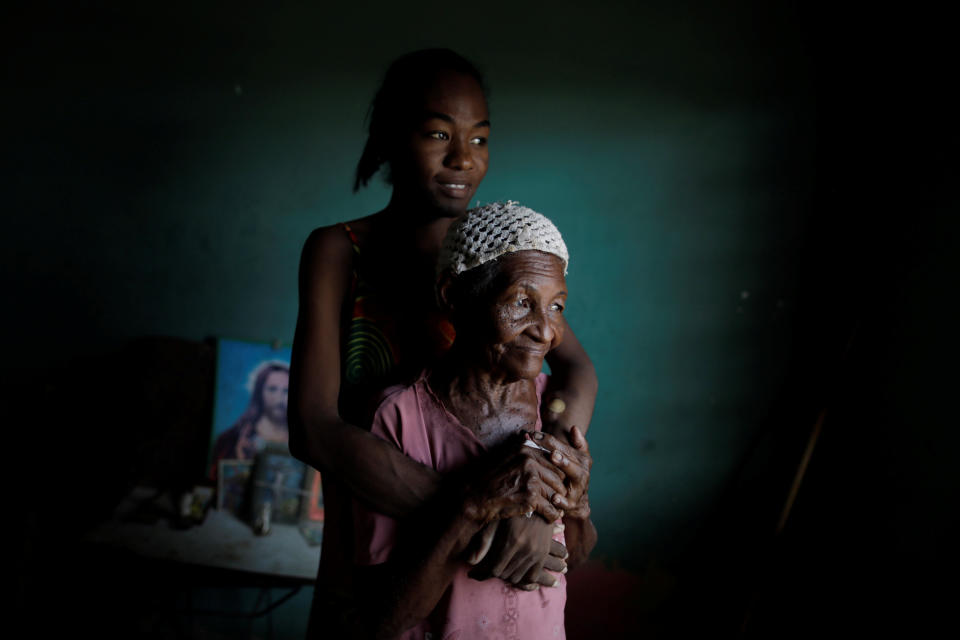 Aidalis Guanipa, 25, a kidney disease patient, poses for a photo with her 83-year-old grandmother, while they wait for the electricity to return, at her house during a blackout in La Concepcion, Venezuela. (Photo: Ueslei Marcelino/Reuters)