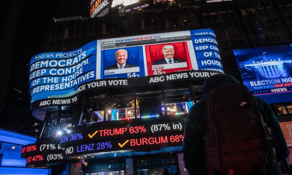 Election results are displayed in Times Square, New York. The Arizona projected result was a key turning point in the 2020 election.