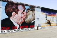 <p>One of the most famous historical physical borders in the world, and an existing relic of the Cold War, still partly stands in the German capital. A section of the wall, which was dismantled in 1991, is home to the <a href="https://www.visitberlin.de/en/east-side-gallery" rel="nofollow noopener" target="_blank" data-ylk="slk:East Side Gallery;elm:context_link;itc:0;sec:content-canvas" class="link ">East Side Gallery</a> – 1,316 metres of different works of art.</p>