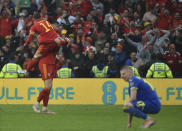 Wales players celebrate at the end of the World Cup 2022 qualifying play-off soccer match between Wales and Ukraine at Cardiff City Stadium, in Cardiff, Wales, Sunday, June 5, 2022. Wales won 1-0. (AP Photo/Rui Vieira)