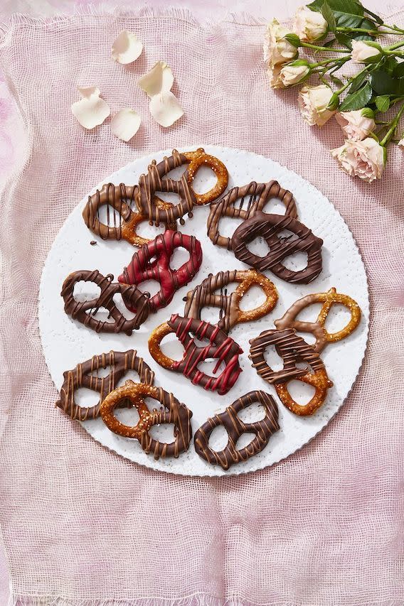 chocolate covered pretzels on a white plate