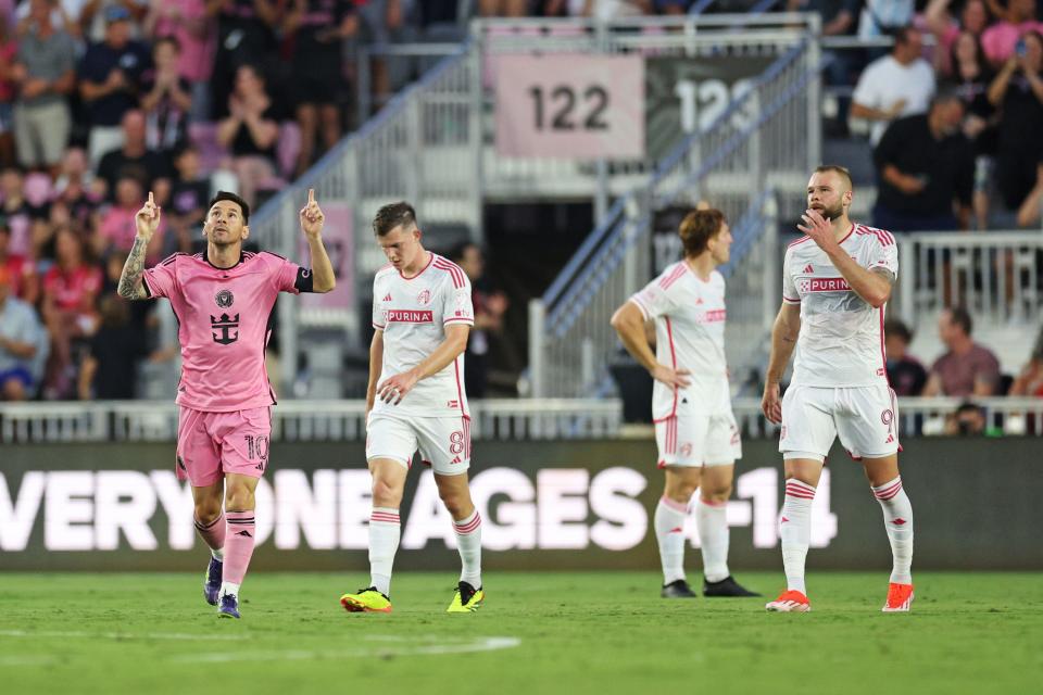 Lionel Messi celebrates after scoring a goal against St. Louis.