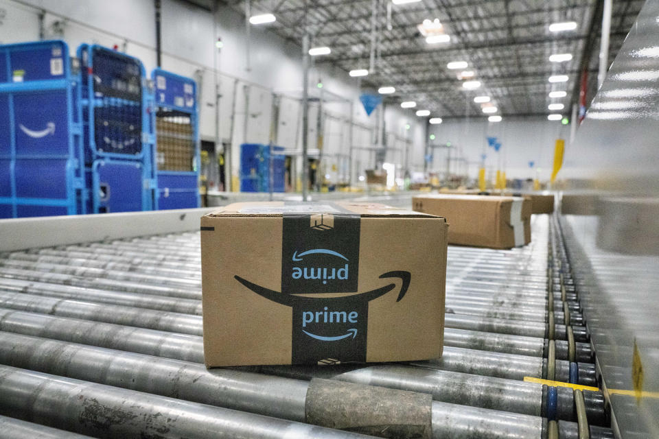 An Amazon package moves along a conveyor belt at Amazon's DAX7 delivery station during Amazon's annual Prime Day event in South Gate, California, Tuesday, July 16, 2024. (AP Photo/Richard Vogel)