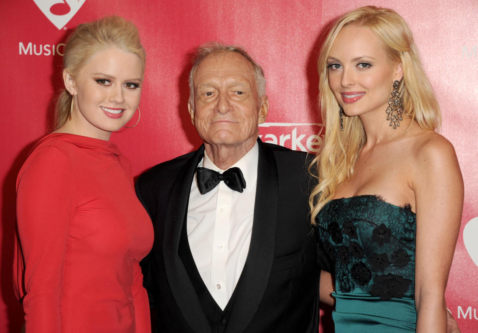 Kristina Shannon, Hugh Hefner, and Karissa Shannon arrive at the 2012 MusiCares Person of the Year Tribute to Paul McCartney in L.A. on Feb. 10. (Photo: Jason Merritt/Getty Images)