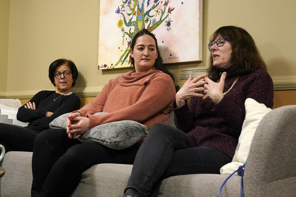 CORRECTS SPELLING OF MALLINGER IN SECOND REFERENCE Suzanne Schreiber of the Tree of Life congregation, left, Amy Mallinger, who lost her grandmother Rose Mallinger, and Jo Recht of the Dor Hadash congregation meet to discuss the process that was used to develop a memorial outside the Tree of Life synagogue in Pittsburgh Dec. 4, 2023. 11 worshippers lost their lives when a gunman opened fire during services at the Tree of Life synagogue on Oct 27, 2018. (AP Photo/Gene J. Puskar)