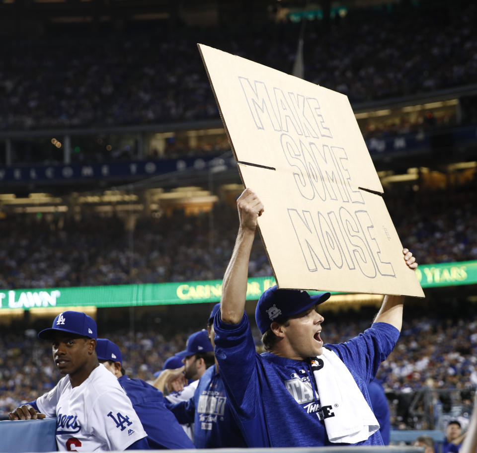 Los Angeles Dodgers starting pitcher Rich Hill fires up the crowd during the seventh inning of Game 2 of baseball’s National League Division Series against the Arizona Diamondbacks in Los Angeles, Saturday, Oct. 7, 2017. (AP)