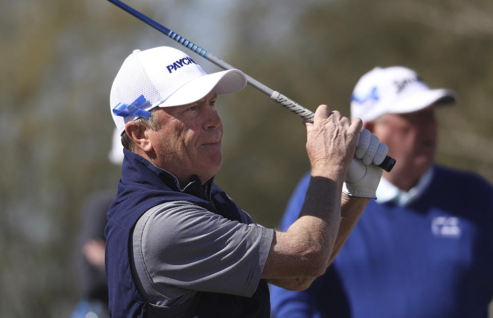 Jeff Sluman watches his tee shot off three during the Cologuard Classic golf tournament at Omni Tucson National Resort in Tucson, Ariz., Friday, Feb. 25, 2022. (Rick Wiley/Arizona Daily Star via AP)