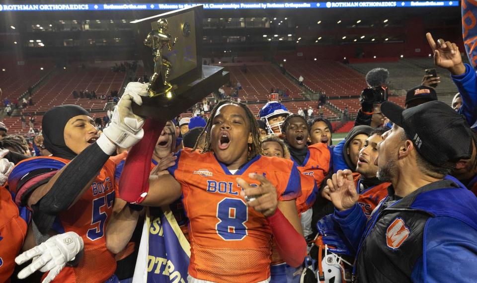 Millville celebrate their championship. Millville Football defeats Northern Highlands 18-14 in NJSIAA Group 4 Final on December 3, 2022 in Piscataway, NJ. 