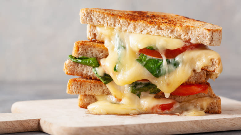 grilled cheese with veggies and melty cheese
