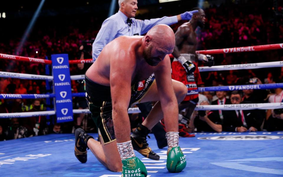 Fury picks himself up after being knocked down twice in one round for the first time - AP
