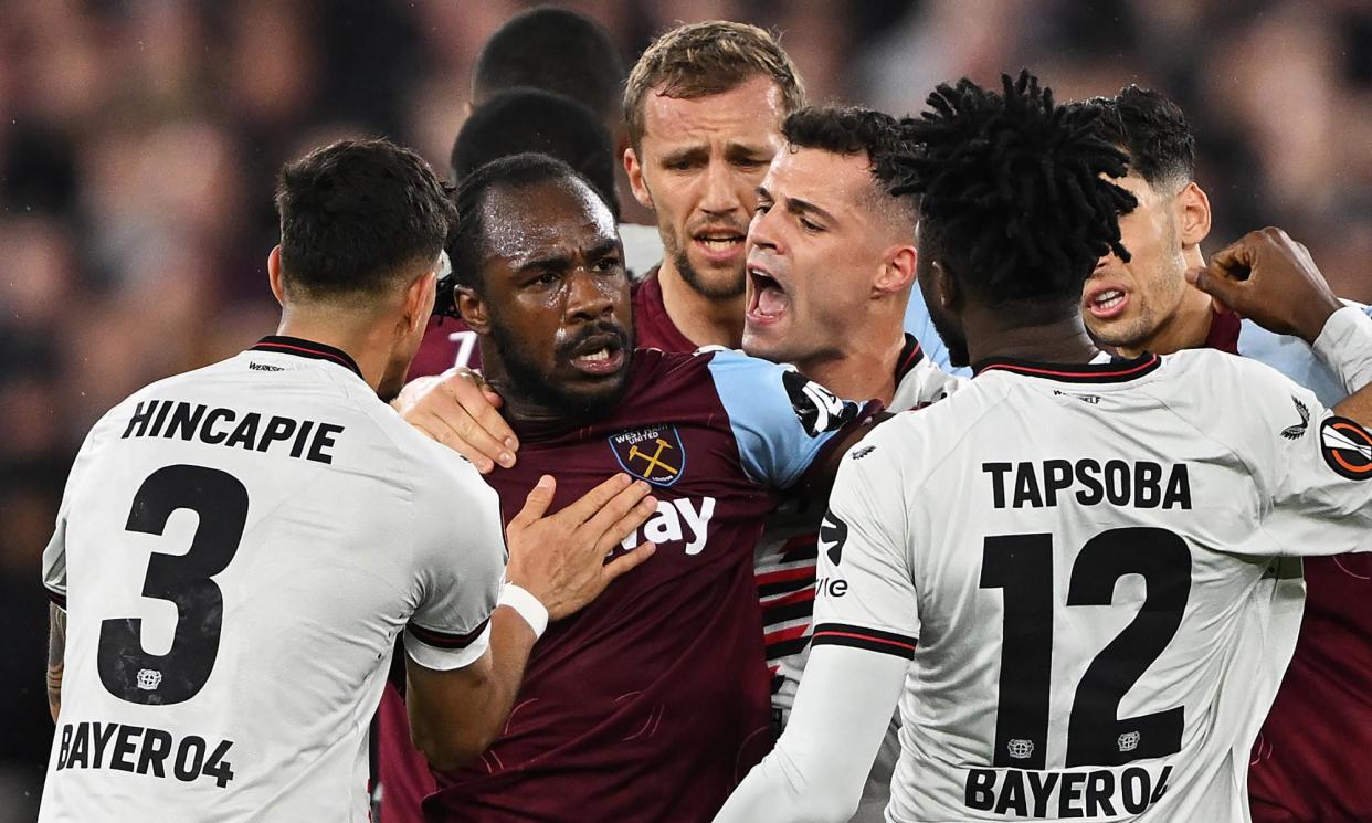 <span>Michail Antonio clashes with Edmond Tapsoba as West Ham lost on aggregate to Bayer Leverkusen.</span><span>Photograph: Mike Hewitt/Getty Images</span>