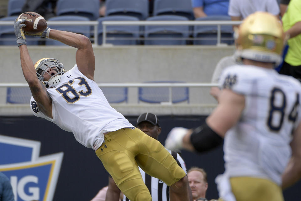 Notre Dame wide receiver Chase Claypool (83) catches a pass in the end zone for a 24-yard touchdown during the first half of the Camping World Bowl NCAA college football game against Iowa State Saturday, Dec. 28, 2019, in Orlando, Fla. (AP Photo/Phelan M. Ebenhack)