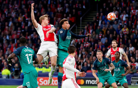 Soccer Football - Champions League Semi Final Second Leg - Ajax Amsterdam v Tottenham Hotspur - Johan Cruijff Arena, Amsterdam, Netherlands - May 8, 2019 Ajax's Matthijs de Ligt scores their first goal Action Images via Reuters/Matthew Childs