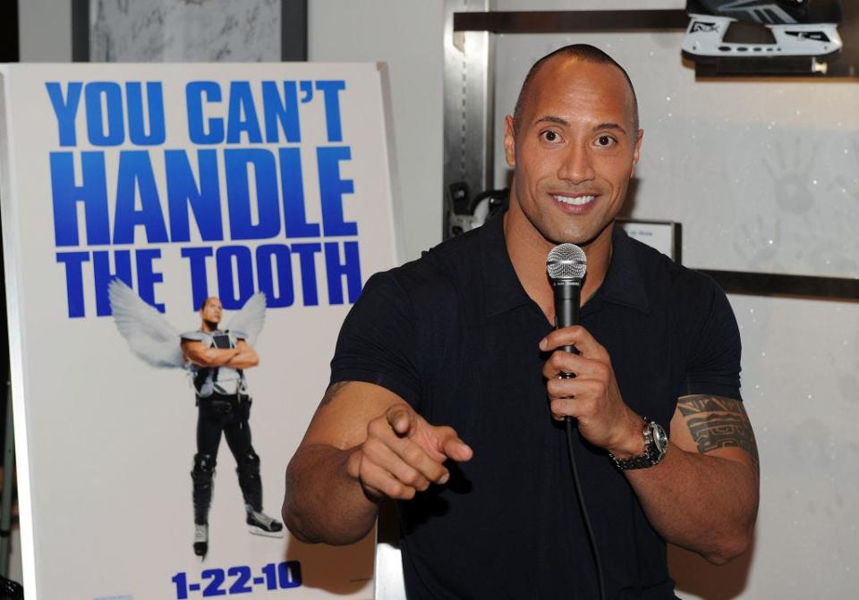 Dwayne The Rock Johnson and a poster for the movie The Tooth Fairy