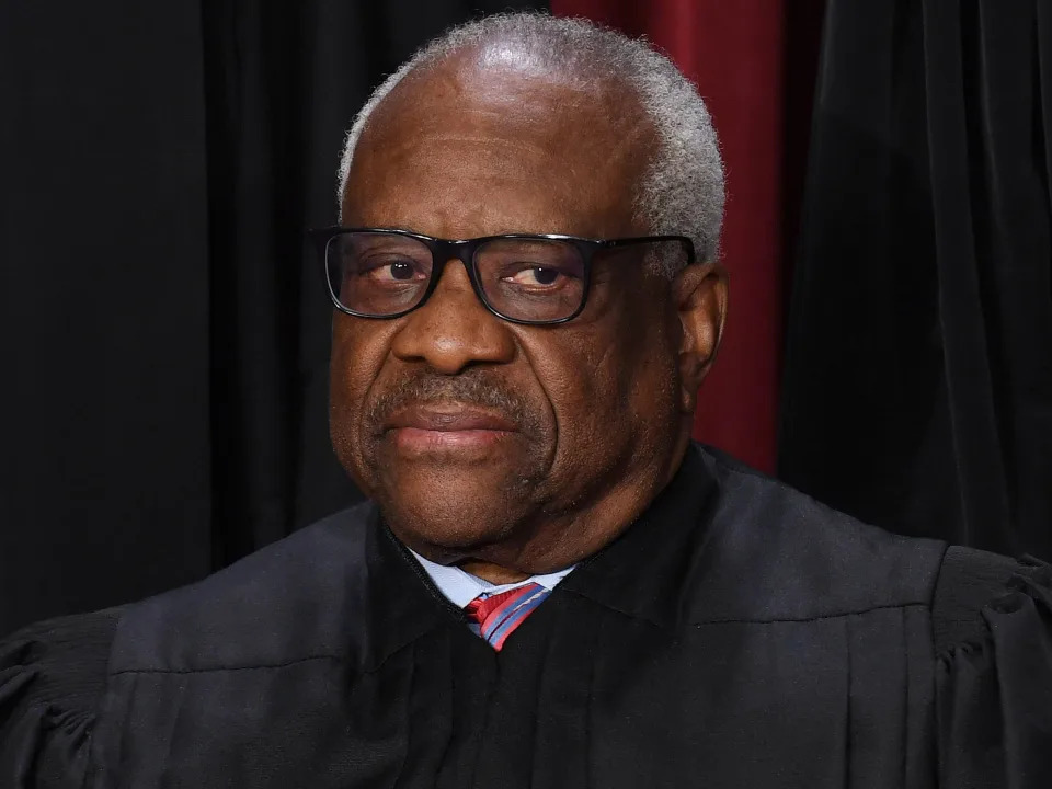 Associate US Supreme Court Justice Clarence Thomas poses for the official photo at the Supreme Court in Washington, DC on October 7, 2022.