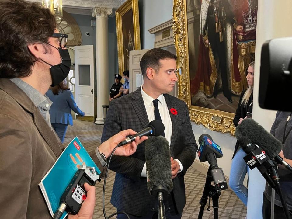 Liberal Leader Zach Churchill speaks to reporters at Province House. (Paul Poirier - image credit)