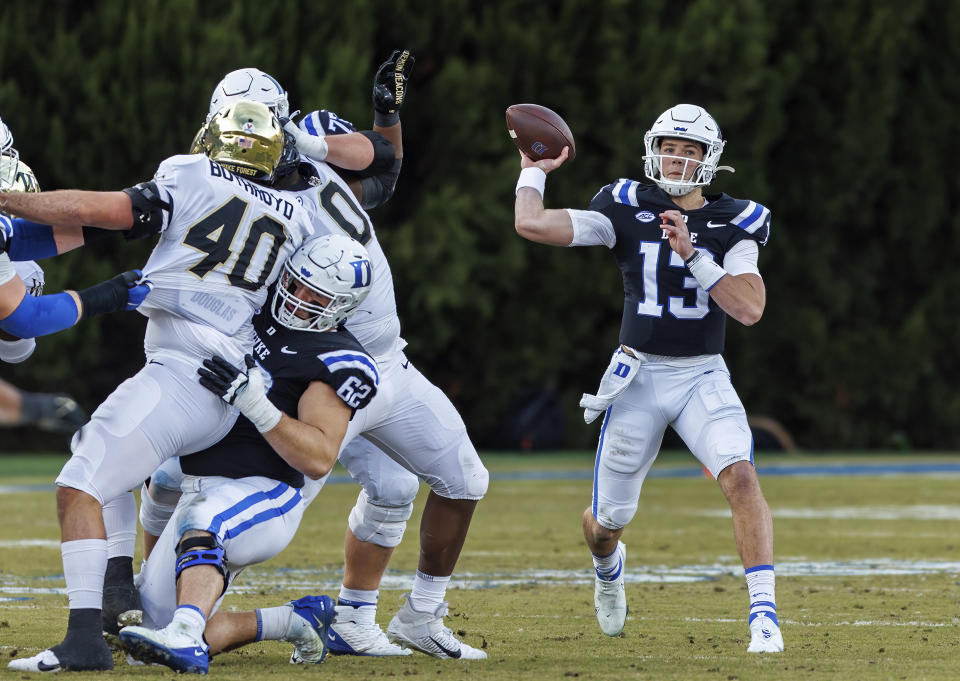 Duke's Riley Leonard (13) makes a throw during the first half of an NCAA college football game against Wake Forest in Durham, N.C., Saturday, Nov. 26, 2022. (AP Photo/Ben McKeown)