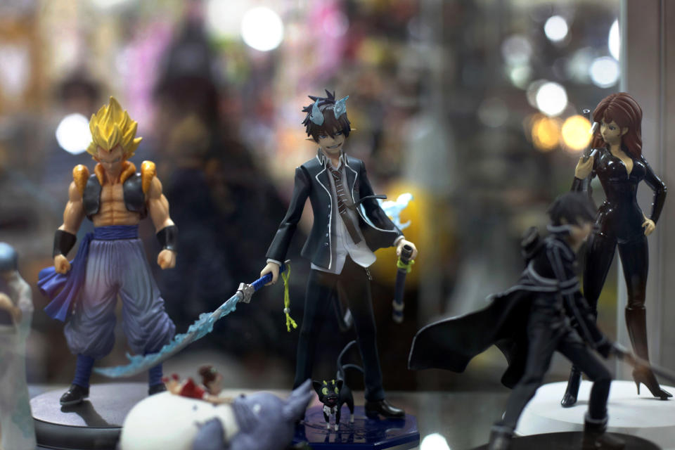 In this May 25, 2013 photo, figures of South Korean comic book characters stand for sale at the Arenales shopping center in Lima, Peru. The Arenales shopping center has entire floors dedicated to South Korean music, clothes and food. (AP Photo/Martin Mejia)