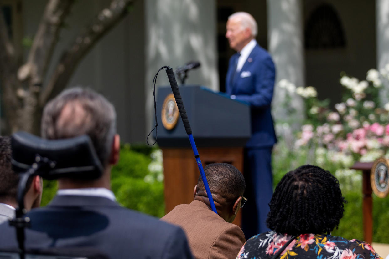 Audience members listen as president Joe Biden speaks during an event marking the 31st anniversary of the Americans with Disabilities Act in the Rose Garden of the White House in Washington, D.C., on July 26, 2021.