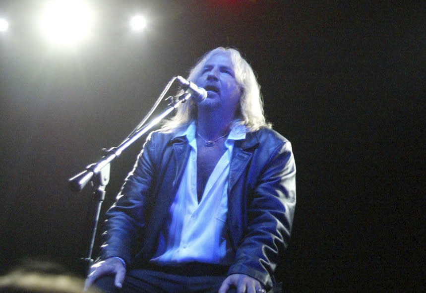 Singer Jack Russell of the band Great White performing onstage.